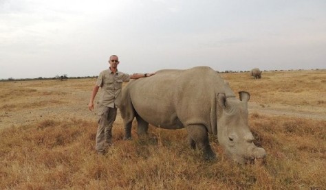 Jean_with_a_Northern_White_Rhino_female_at_the_Ol_Pejeta_Conservancy.